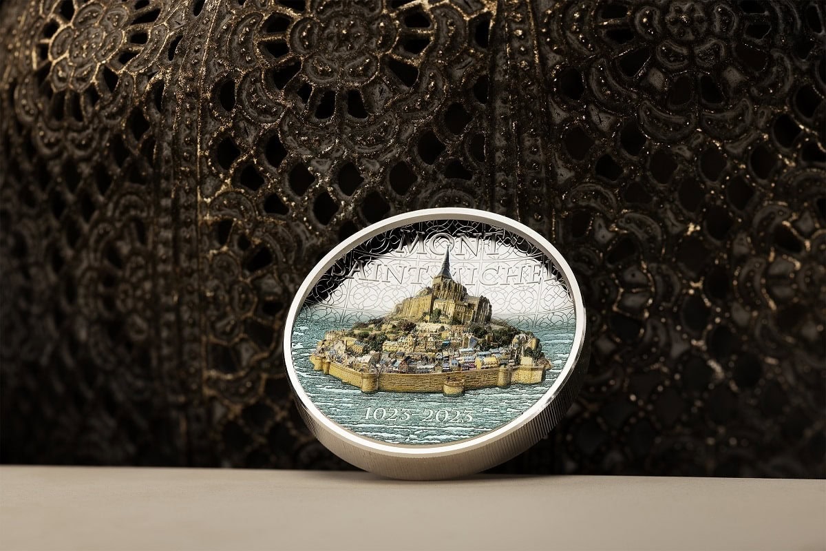 Mont-Saint-Michel silver collectible coin, France 2023, 10 Euro denomination, detailed depiction of the iconic island with the abbey, surrounded by water, celebrating its 1000-year anniversary.
