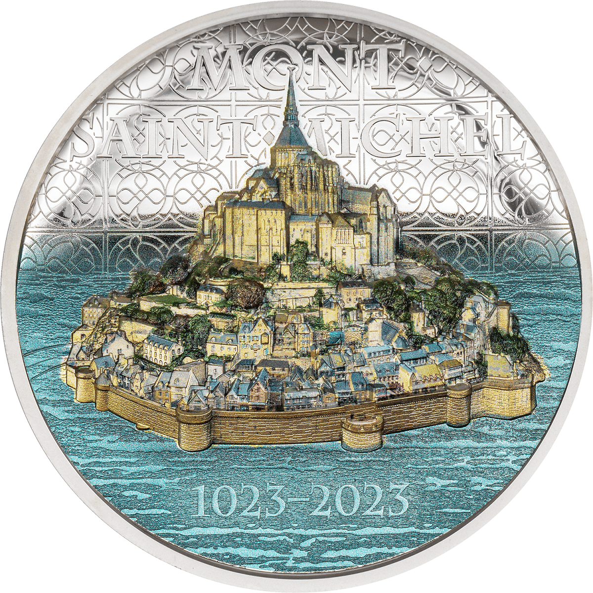 Saint-Michel Mountain, France, collectible silver coin, 1025-2025 anniversary, detailed depiction of Mont Saint-Michel historic site on a blue water background.