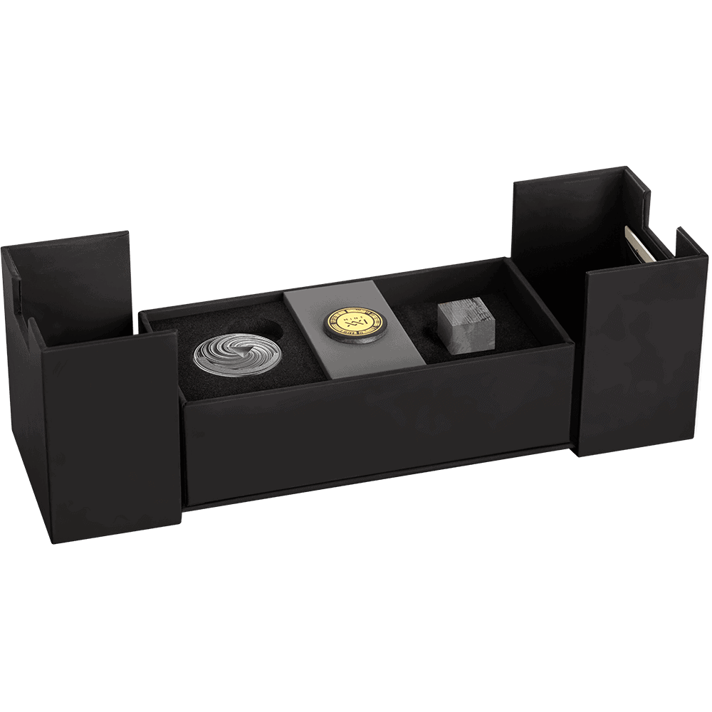 Shiny collectible coin set in black display box, includes gold coin, silver coin, and a metal cube, perfect for numismatic collectors and investment purposes.