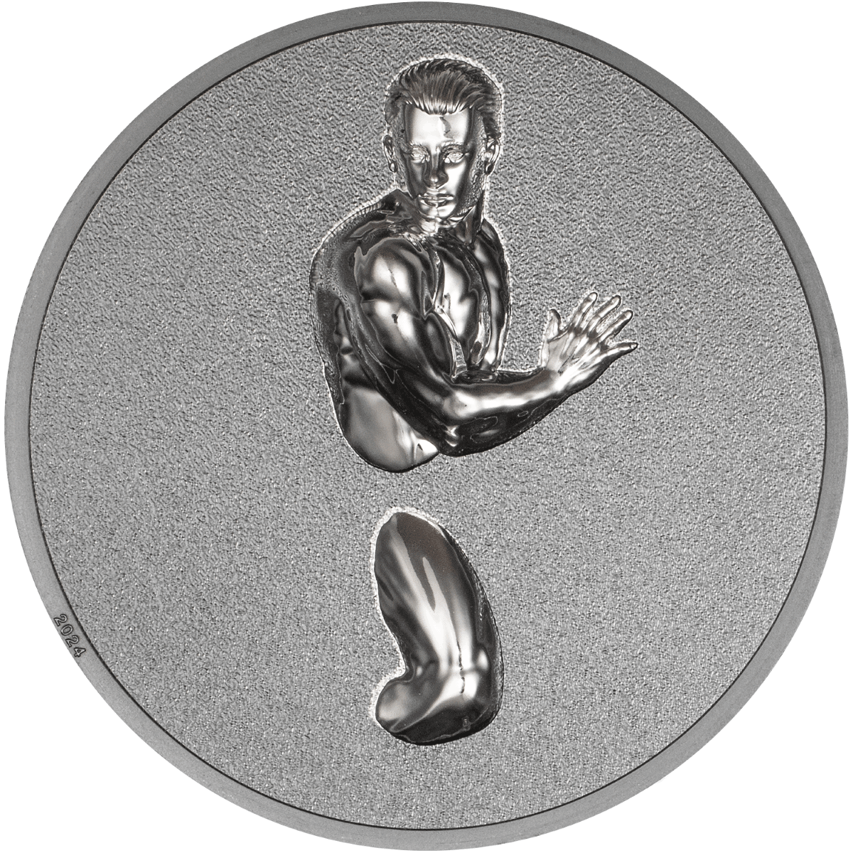 Shiny silver collectible coin featuring a muscular woman with a determined expression, clenched fists, and "2024" inscribed on the lower left edge, representing a modern design with intricate details.