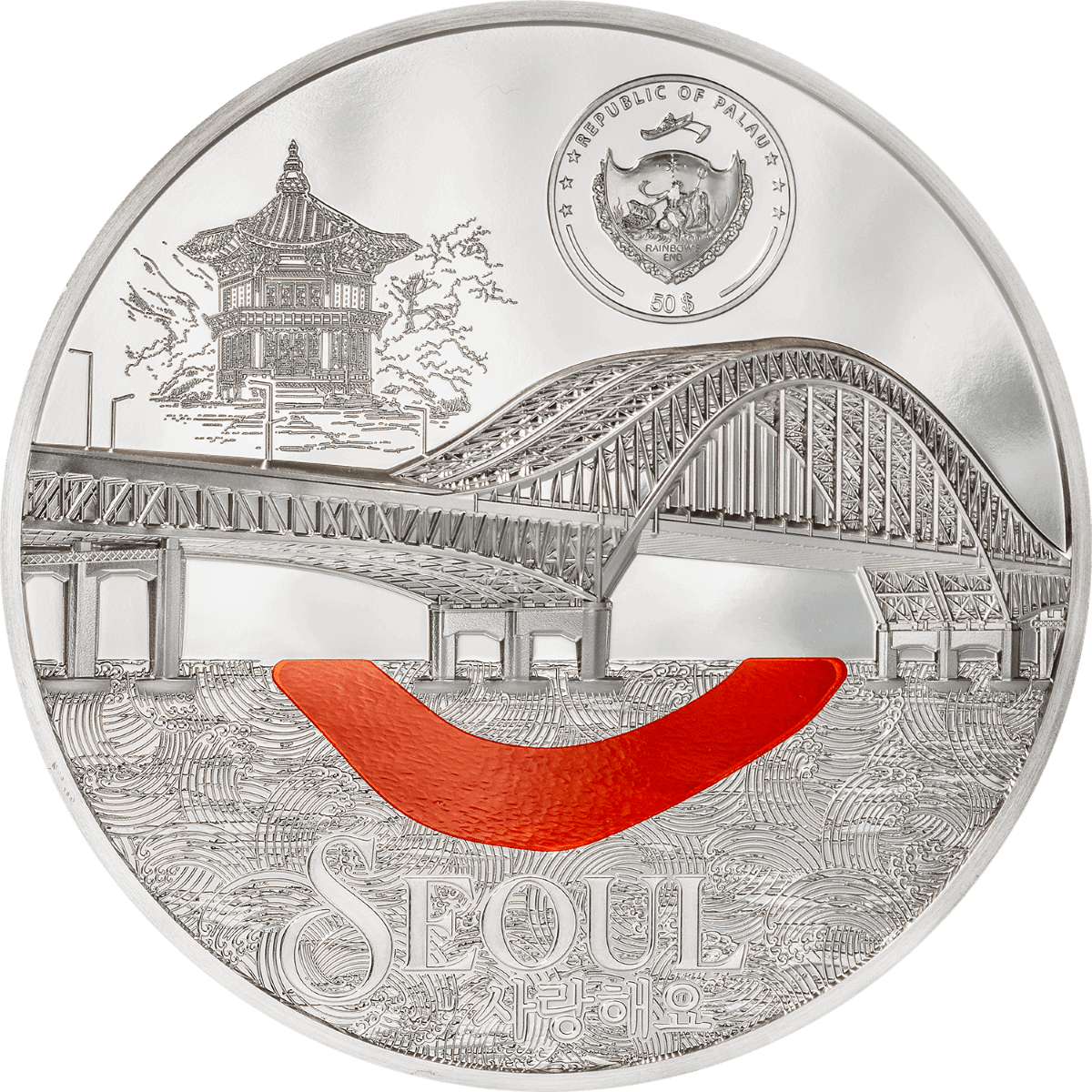 Shimmering silver coin featuring a colorful red smiley face, a bridge, and traditional Korean architecture, along with a shield-shaped emblem from Palau and the word "SEOUL" with Korean characters below.