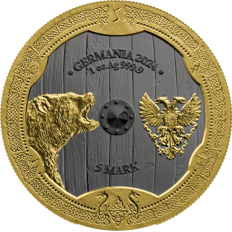 Gold and silver commemorative coin featuring a bear and an eagle, inscribed with "GERMANIA 2021" and "1 OZ Ag 999.9," valued at 5 marks. The coin has intricate Celtic knot border design and a wood-textured background.