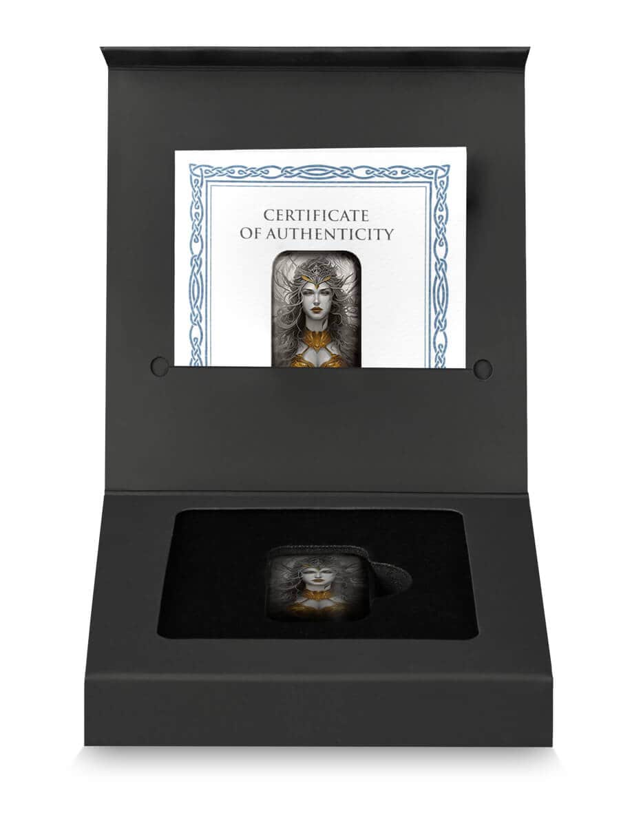 Intricate collectible coin featuring a mythical female figure, encased in black presentation box with certificate of authenticity.