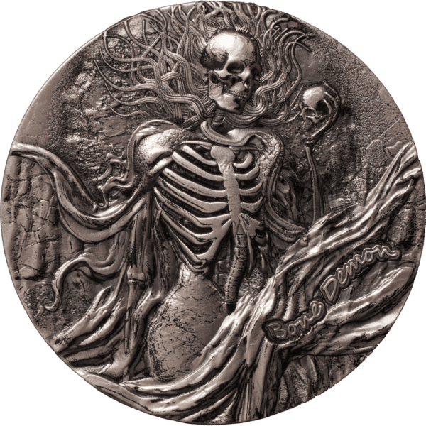 Silver coin featuring a skeletal figure with flowing hair and ribcage details, labeled "Bone Dancer", representing a Halloween or gothic theme, with intricate engraved design.