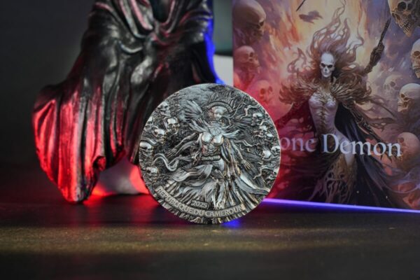 Shiny collectible coin box featuring a skull skeleton surrounded by dark smoke and fiery background, showcasing detailed specifications and craftsmanship for limited edition numismatic pieces.