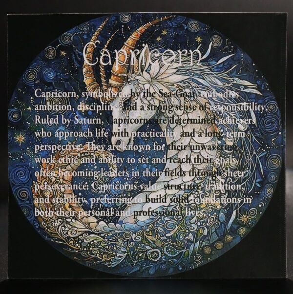 Capricorn zodiac sign on a collectible coin with intricate sea goat design, symbolizing ambition, discipline, and responsibility, ruled by Saturn, known for practicality and leadership qualities.