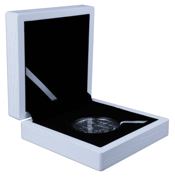 The 2025 Solomon Islands 100 gram silver Statue of Zeus coin presented in its open white display case.