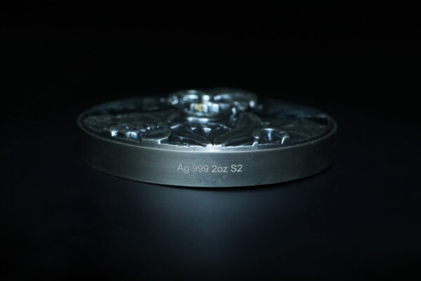 Ag 999 2oz S2 silver collectible coin with intricate design on dark background.
