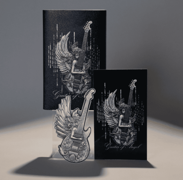 Guitar of Angel collectible coin with intricate angel and guitar design, presented with its elegant packaging and display stand.