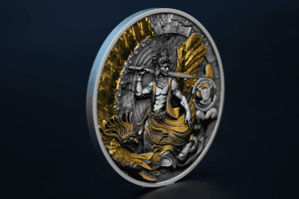 Intricate collectible coin featuring a warrior with a sword, detailed gold and silver accents, and dynamic background design, showcasing craftsmanship and artistic detail.