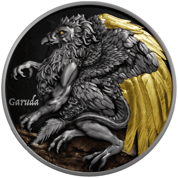 Silver coin featuring a detailed mythical griffin with golden wings, year and country inscription, and intricate design.