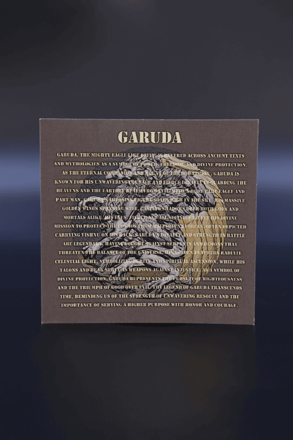 Garuda coin 2023, Indonesian collectible coin featuring Garuda mythological bird with detailed inscription about its symbolism and divine protection.