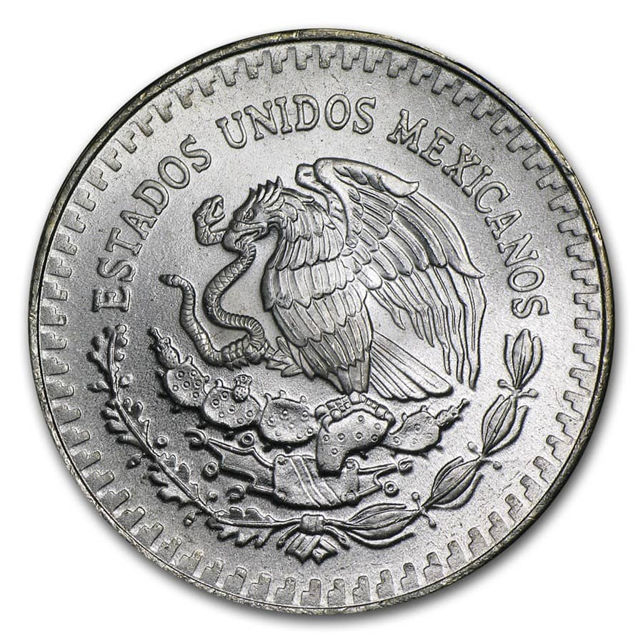 The Mexican Libertad 1 oz Silver BU Coin, random year, minted in Mexico, angled view, with detailed eagle design.