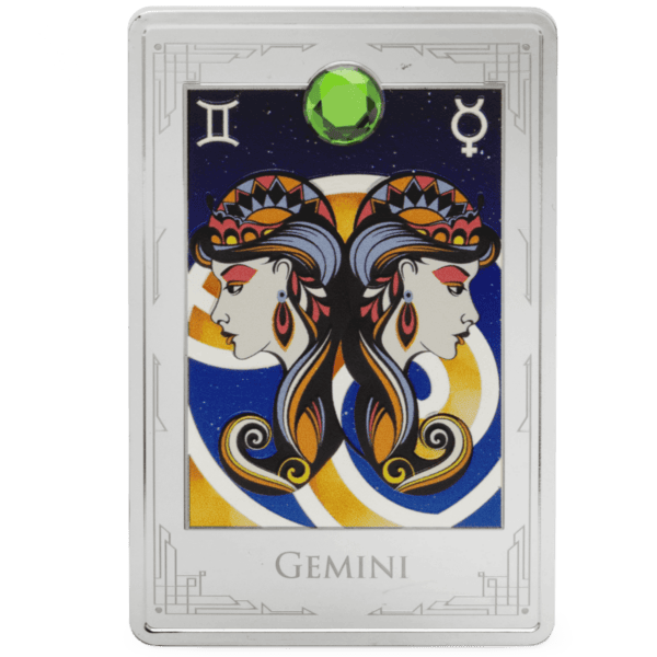 Gemini 2023 zodiac coin featuring twin women with colorful hair and celestial background, accented with a green gemstone at the top.