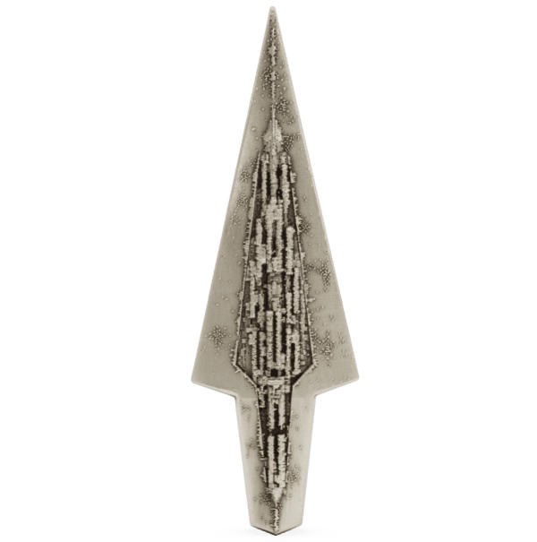 Shattered glass skyscraper metal art sculpture with intricate geometric patterns.