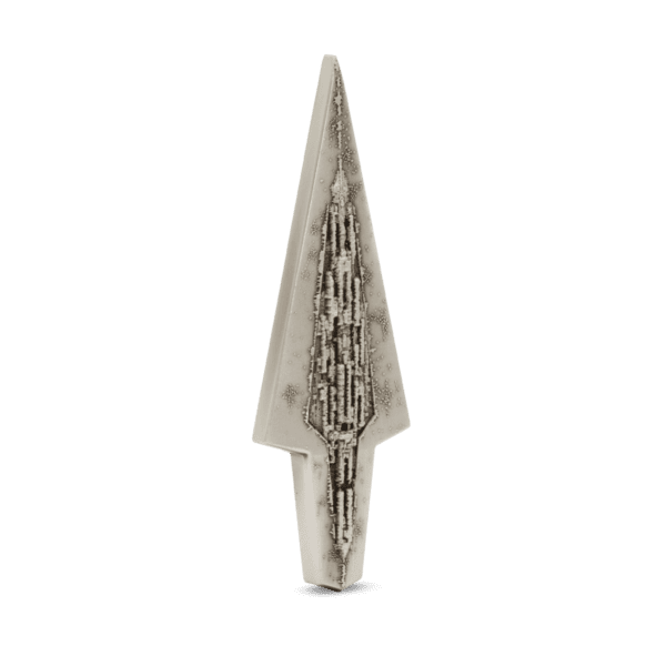 Silver collectible coin featuring a detailed skyscraper design from 2022, issued in the USA, with a unique geometric shape and intricate surface details.