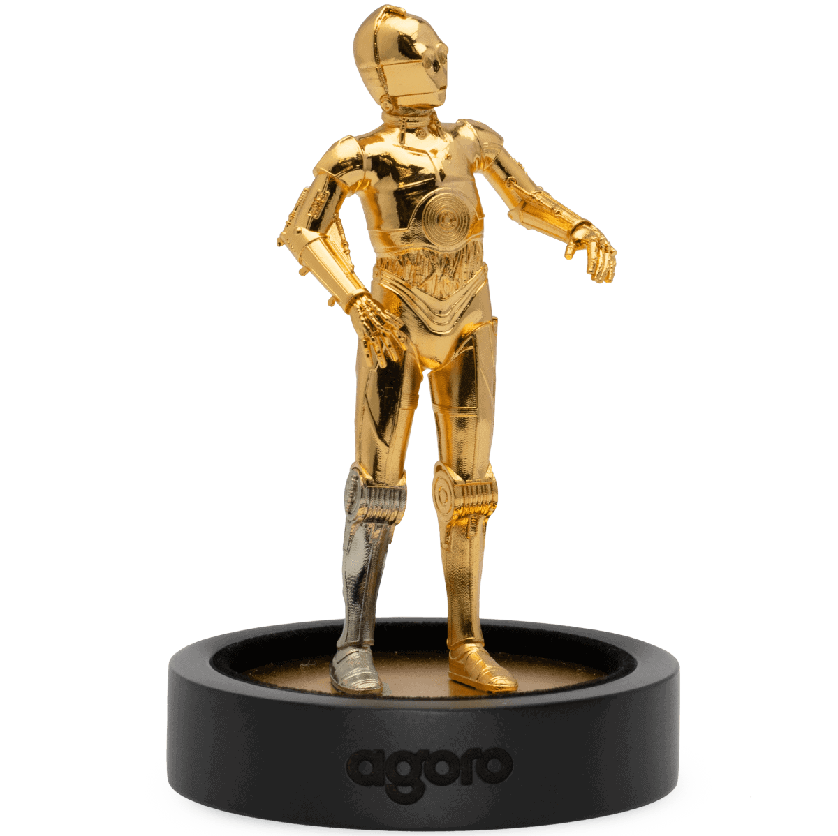 Gold robotic humanoid figurine, 2023, collectible art statue on black display base.