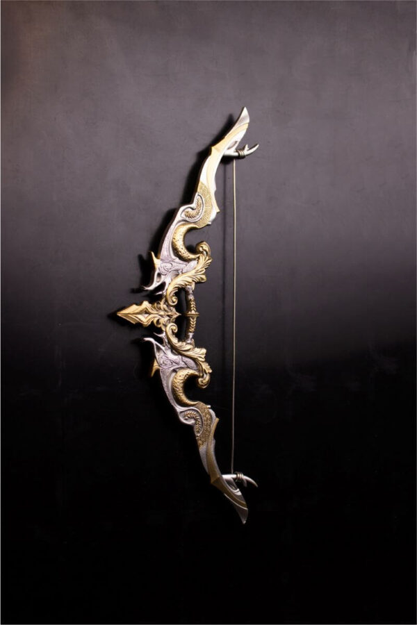 Left side of the front of the 2025 South Korea Divine Weapons Crescent Bow 2 oz Silver Antiqued Gilded Bar