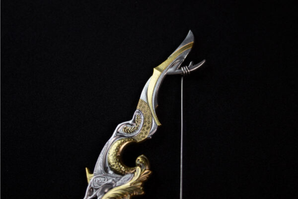 Zoomed in view of the 2025 South Korea Divine Weapons Crescent Bow 2 oz Silver Antiqued Gilded Bar
