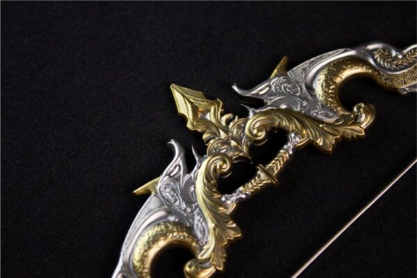 Zoomed in view of the front of the 2025 South Korea Divine Weapons Crescent Bow 2 oz Silver Antiqued Gilded Bar