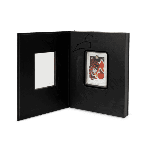 Open GR Reserve display box showcasing the 2025 Niue Star Signs of the Zodiac Leo 2 oz Silver Colorized Proof Coin with vibrant red and gold detailing, housed in a black capsule within a velvet-lined compartment, and an illustrated star-map insert on the left panel.