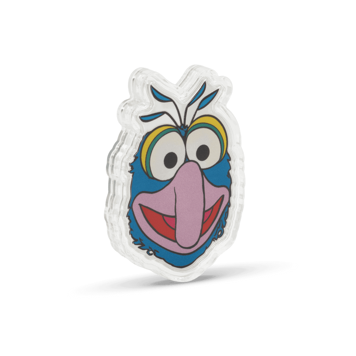 Colorful cartoon character pin featuring a blue face with large eyes, a pink nose, and a smiling mouth, adorned with blue and yellow hair-like details and outlined in black.