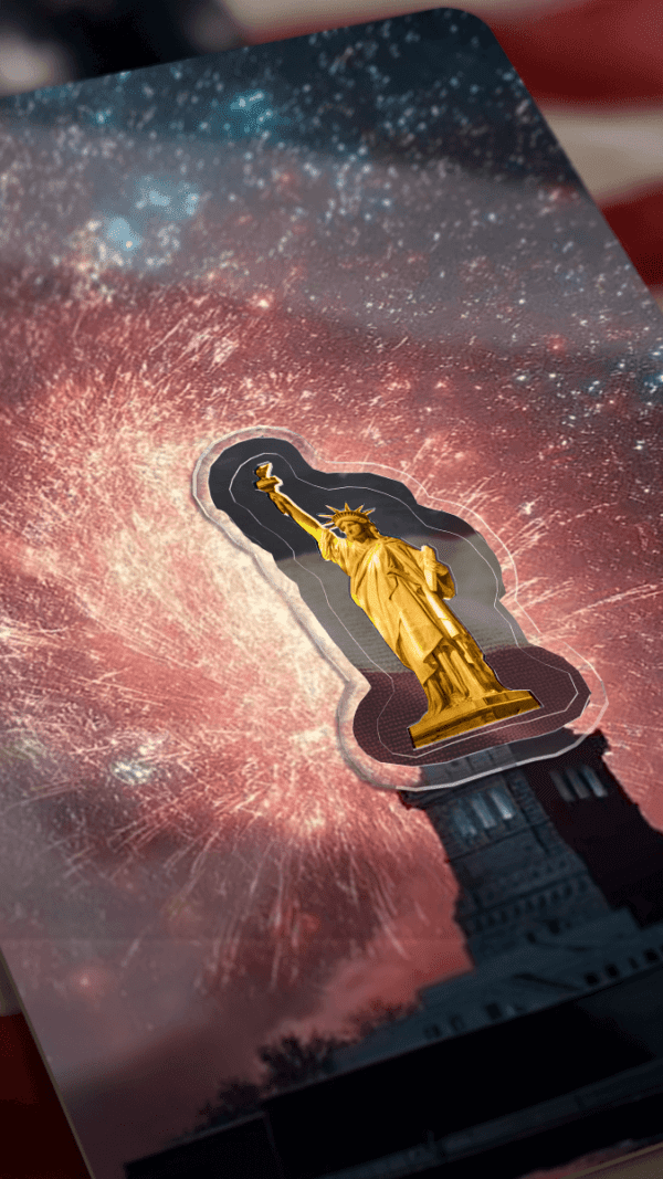 A close-up, slightly angled view of the 2025 Niue 4th of July Statue of Liberty-shaped 1/1000 oz gold coin within its clear protective housing, set against a dark background with a swirling red and orange cosmic nebula. The miniature golden Statue of Liberty glows brightly, standing on its dark pedestal, with hints of the card's edge visible.