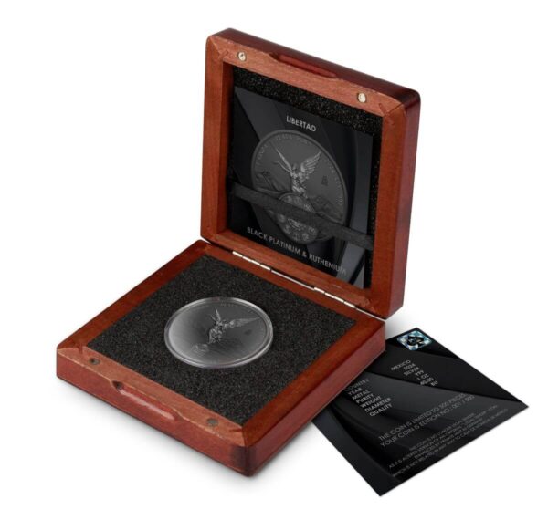 Open wooden display box showcasing the 2024 Mexico Libertad Black Platinum Ruthenium 1 oz Silver Colorized Coin with black interior lining; the coin features Winged Victory in silver relief against a dark ruthenium background, accompanied by a certification card.