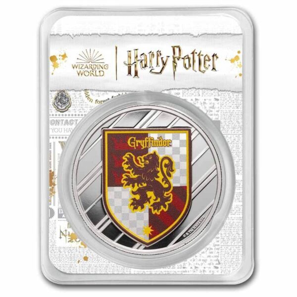 Front view of the 2025 Harry Potter Gryffindor 1 oz Silver Colorized Coin sealed in tamper-evident packaging, featuring the red-and-gold lion crest on a textured background with Harry Potter branding at the top and clear capsule enclosure.