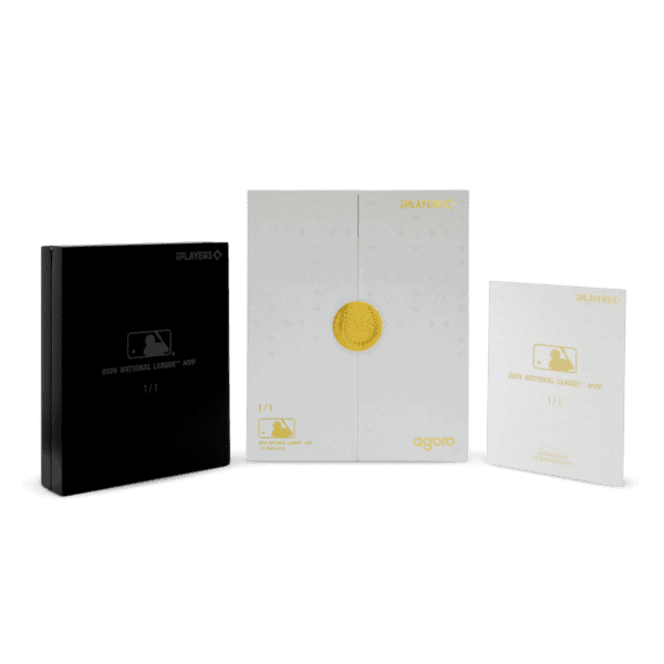 A collection of three items from a Major League Baseball trading set. From left to right: a black case, a gray box with a gold circle, and a smaller, white box with the letters "GR."