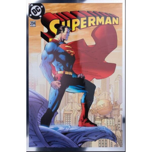 Front view of the 2025 Samoa Superman 204 Iconic Covers 1 oz Silver Colorized Foil featuring color artwork of Superman in red cape on rooftop ledge with cityscape background; “Superman” title prominently displayed at top.