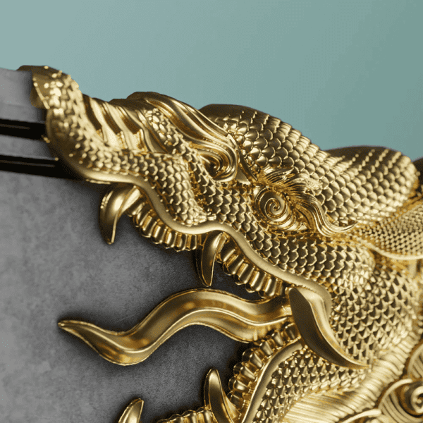 Close-up view of gold dragon detail sculpted onto the 2025 Samoa Green Dragon Crescent Blade Coin; scales, claws, and stylized anatomy rendered in high-relief against silver background with antiqued texture.