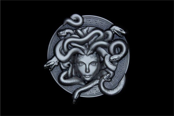 Studio closeup of the 2025 South Korean Serpent Crown Medusa 2 oz Silver Antiqued High Relief Stacker showing Medusa’s head surrounded by intertwined snakes on black background; detailed high-relief textures rendered in antiqued silver.