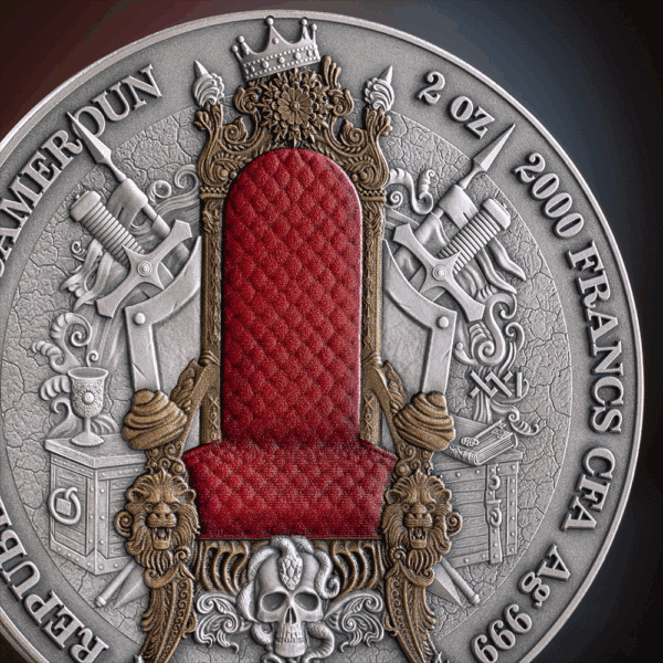 The reverse side of a 2025 Cameroon French Empire silver coin, featuring a red-enameled throne and a detailed, antiqued design.