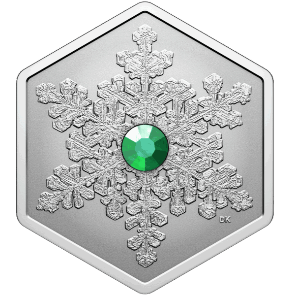 Hexagonal silver coin featuring intricate snowflake design with green crystal insert