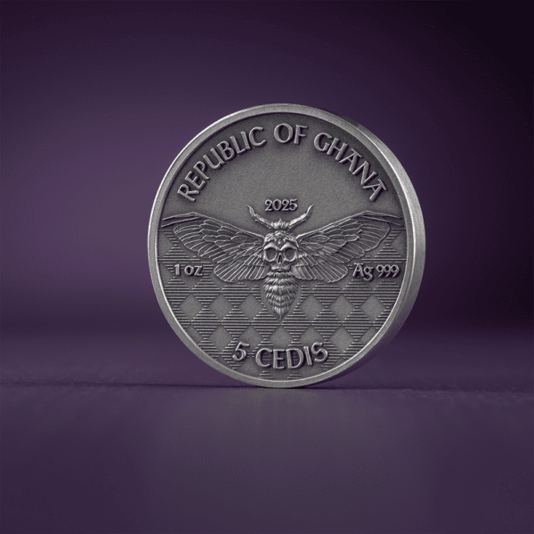 Reverse of 2025 Ghana Memento Mori Gangster Coin with winged skull, “REPUBLIC OF GHANA,” “5 CEDIS,” and silver purity; high-relief antiqued finish against purple backdrop.