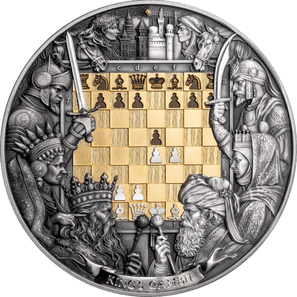 A close-up, front view of the 2025 Niue Chess Battle Kings Gambit 3 oz silver coin. The coin features a detailed scene of a chessboard with a 24k gilded golden chess set. The coin has an antiqued, high-relief finish.