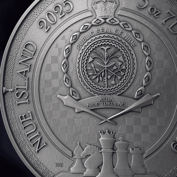 A close-up, back view of the 2025 Niue Chess Battle Kings Gambit 3 oz silver coin. The coin features the coat of arms of Niue, with a central shield and a crown above, all in an antiqued finish.