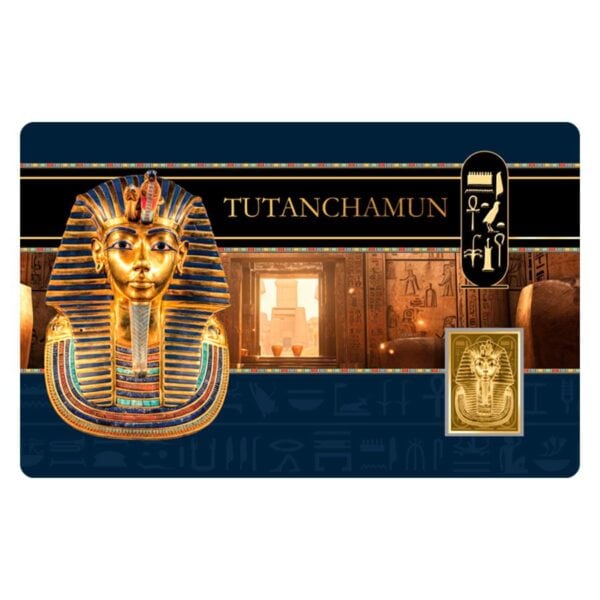 Front card view of 2024 Chad Tutankhamun gold coin featuring golden mask of the pharaoh, hieroglyphic background, and embedded coin with Egyptian architecture.