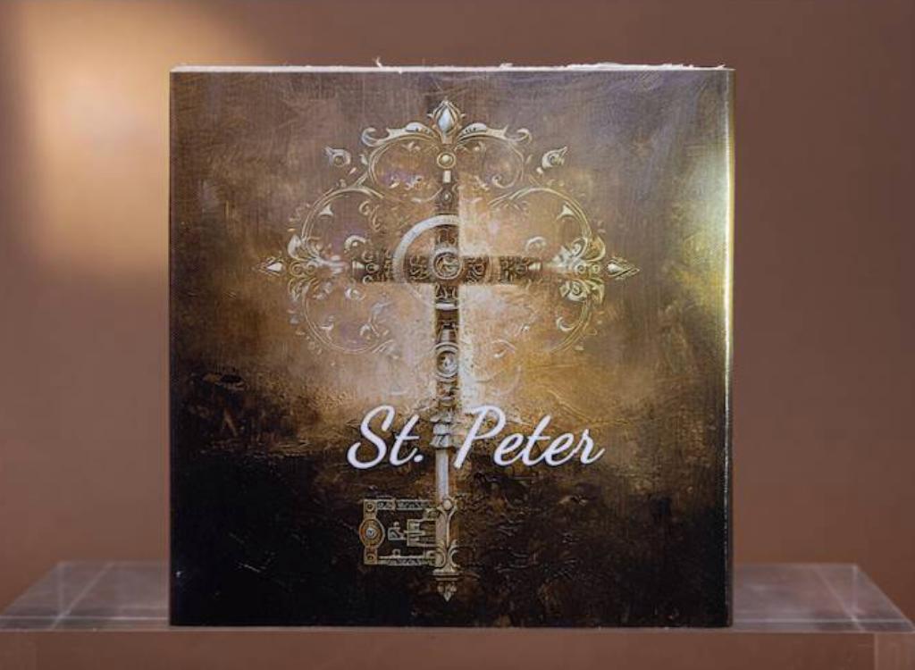 St. Peter collectible coin box with ornate cross design and gold finish, featuring the text "St. Peter" in elegant script.