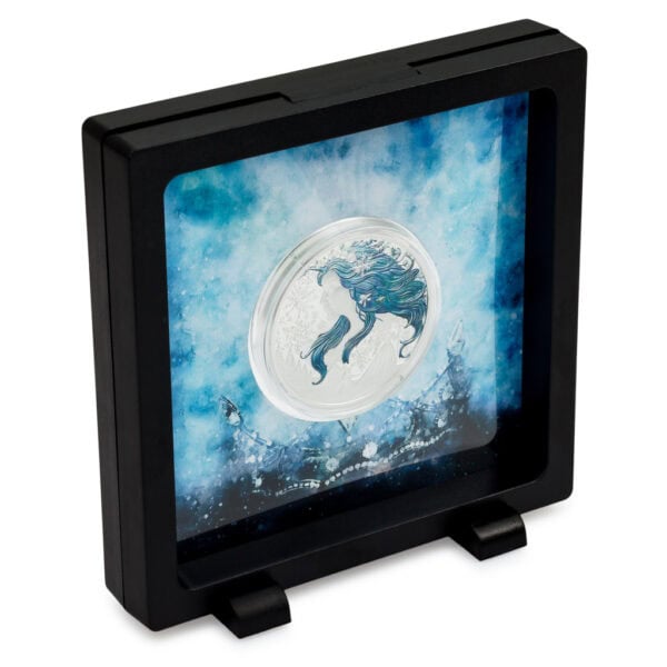 Open presentation box for 2025 Niue Snow Queen silver colorized proof coin, featuring icy blue background and artistic depiction of a character from H.C. Andersen’s fairy tale.