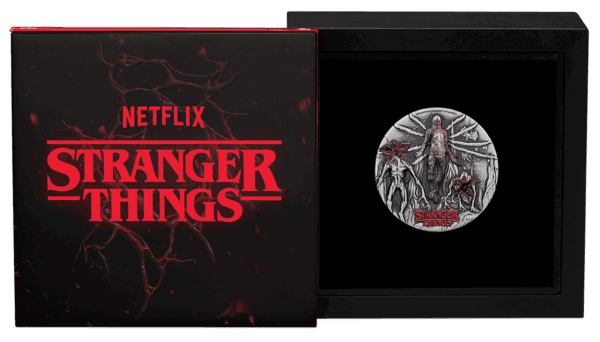 Open display of 2026 Tuvalu Stranger Things Villains 2oz silver colorized antiqued coin featuring Vecna, Demogorgon, and Netflix-branded packaging.