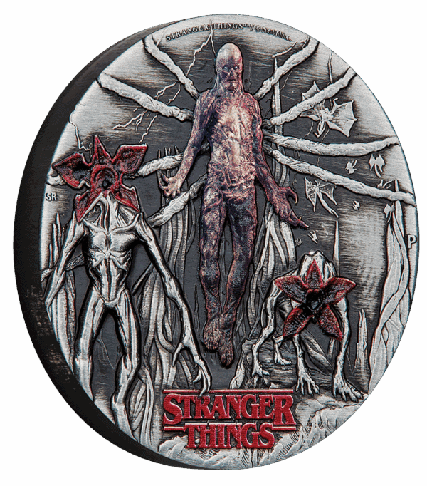 Side view of 2026 Tuvalu Stranger Things Villains 2oz silver colorized antiqued coin featuring Vecna, Demogorgon, and Stranger Things logo.