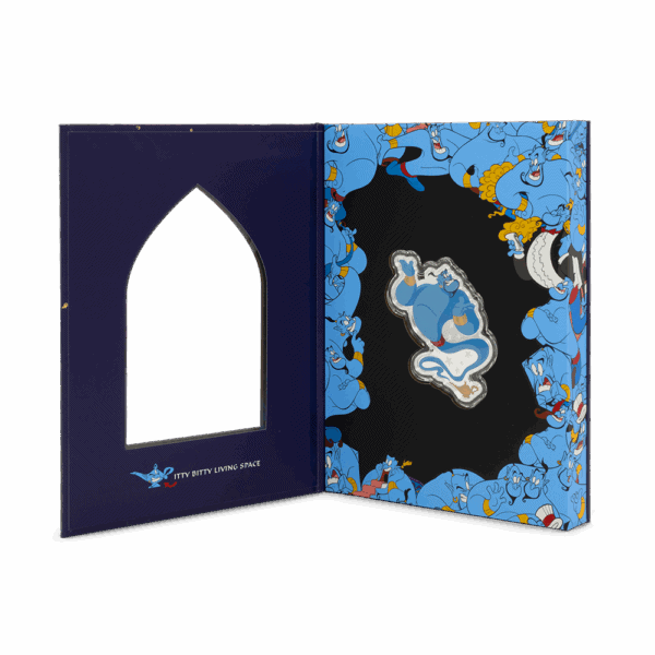 An open, dark blue and light blue commemorative box. The left flap of the box is dark blue with a white arch-shaped cutout. The right side is light blue with a repeating pattern of Disney's Aladdin characters, with a black, Genie-shaped cutout for the coin.