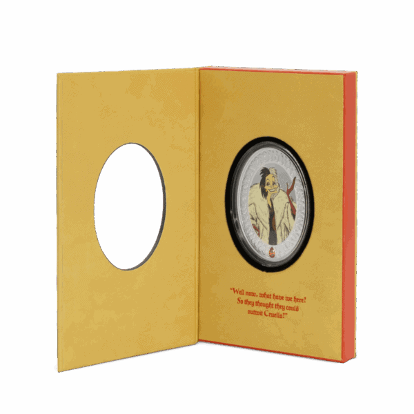 The open presentation box for the 2025 Niue Disney Villains Cruella de Vil coin. The golden-yellow box is folded open, with a circular cutout on the left and the coin in its capsule displayed on the right.