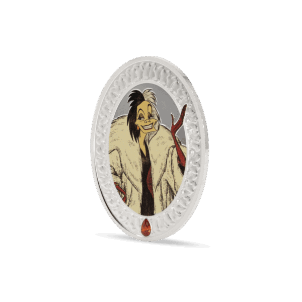 A side view of the 2025 Niue Disney Villains Cruella de Vil coin. The image shows the thickness of the oval-shaped, 2-ounce silver coin and a red jewel set into the bottom of the front side.