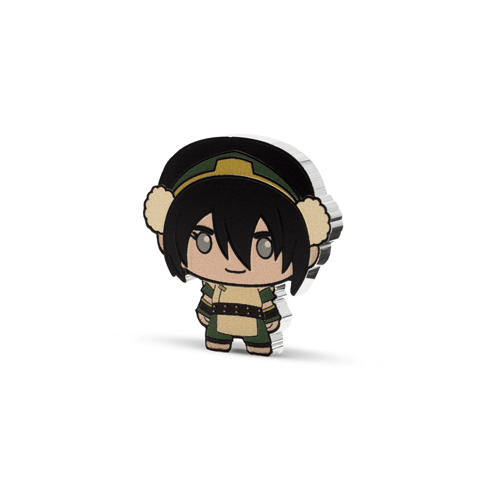 A side view of a Toph Beifong chibi coin, showing the thickness and sculpted relief of the collectible