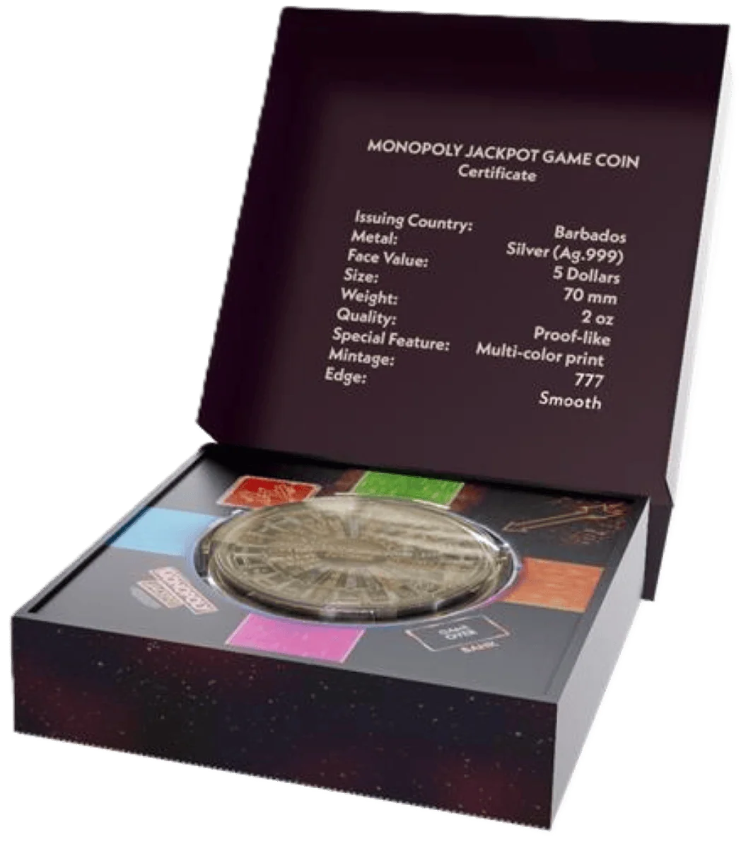 Shiny silver Monopoly jackpot game coin in a branded display box on a starry black background.