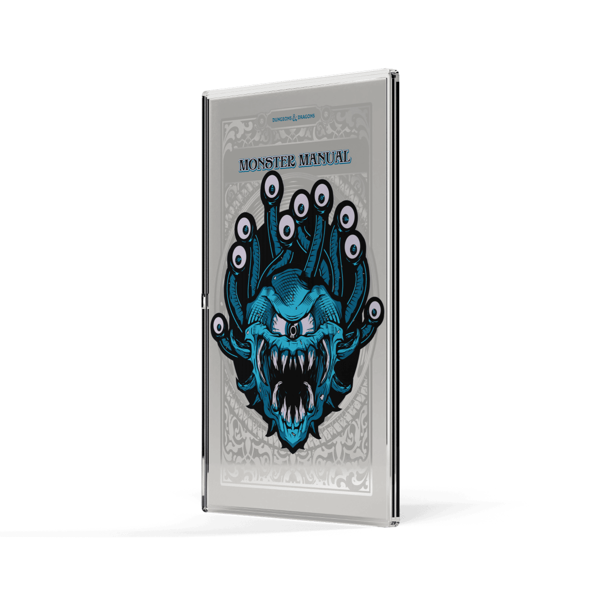 Colorful monster illustration on a collectible card case featuring the "Monster Manual" for Dungeons & Dragons.