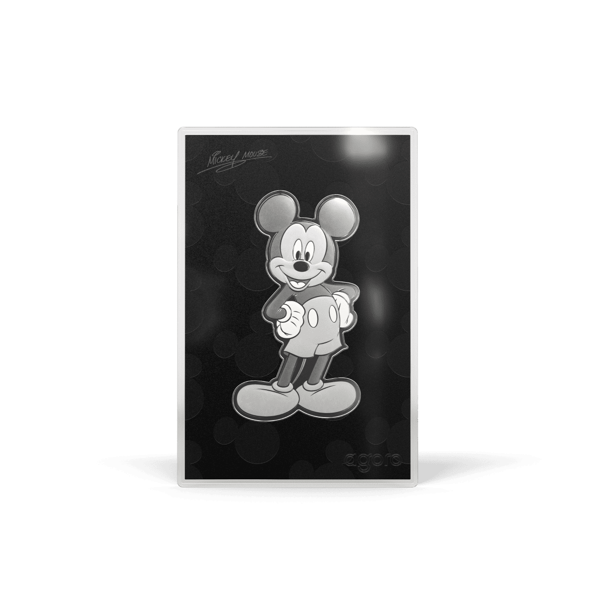 Mickey Mouse silver collectible coin, 2023, Disney, limited edition design, engraved image of classic cartoon character on black background.